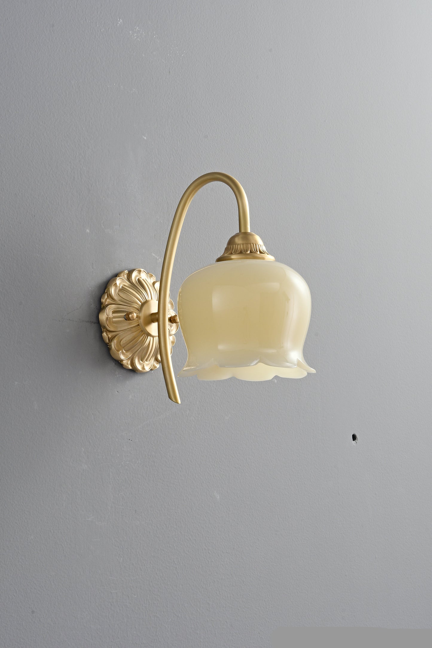 Brass flower resin wall sconce